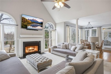 Welcome to this 5-bedroom home that sits on a corner lot and on Towne Lake Hills Golf Club in Georgia - for sale on GolfHomes.com, golf home, golf lot