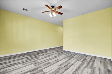 Welcome to this single-story residence located behind the gates on Red Rock Country Club in Nevada - for sale on GolfHomes.com, golf home, golf lot