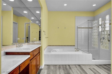 Welcome to this single-story residence located behind the gates on Red Rock Country Club in Nevada - for sale on GolfHomes.com, golf home, golf lot