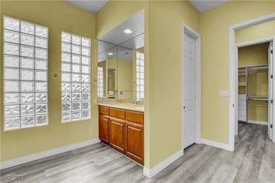 Welcome to this single-story residence located behind the gates on Red Rock Country Club in Nevada - for sale on GolfHomes.com, golf home, golf lot