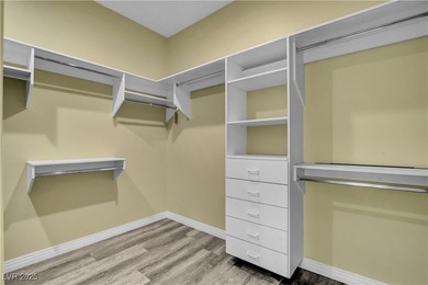 Welcome to this single-story residence located behind the gates on Red Rock Country Club in Nevada - for sale on GolfHomes.com, golf home, golf lot