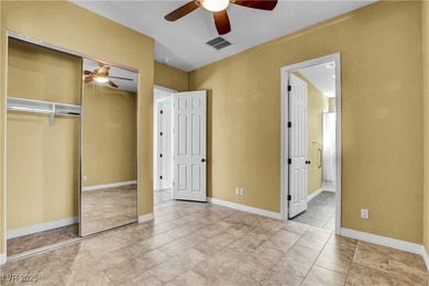 Welcome to this single-story residence located behind the gates on Red Rock Country Club in Nevada - for sale on GolfHomes.com, golf home, golf lot