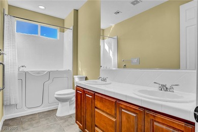 Welcome to this single-story residence located behind the gates on Red Rock Country Club in Nevada - for sale on GolfHomes.com, golf home, golf lot