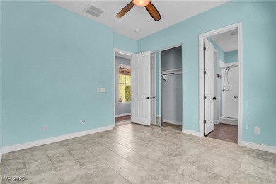 Welcome to this single-story residence located behind the gates on Red Rock Country Club in Nevada - for sale on GolfHomes.com, golf home, golf lot