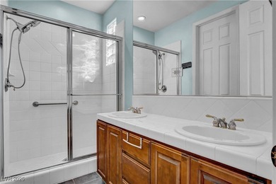 Welcome to this single-story residence located behind the gates on Red Rock Country Club in Nevada - for sale on GolfHomes.com, golf home, golf lot