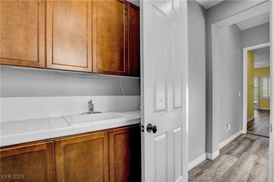 Welcome to this single-story residence located behind the gates on Red Rock Country Club in Nevada - for sale on GolfHomes.com, golf home, golf lot