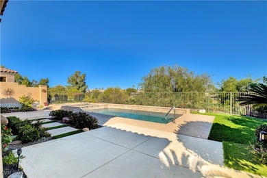 Welcome to this single-story residence located behind the gates on Red Rock Country Club in Nevada - for sale on GolfHomes.com, golf home, golf lot