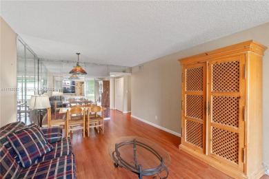 Imagine stepping out your front door and being just steps away on Sunrise Lakes Phase III in Florida - for sale on GolfHomes.com, golf home, golf lot