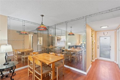 Imagine stepping out your front door and being just steps away on Sunrise Lakes Phase III in Florida - for sale on GolfHomes.com, golf home, golf lot