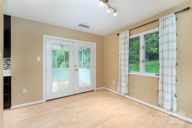 You must see this light-filled, two-story end unit condo at The on Black Mountain Golf Course in North Carolina - for sale on GolfHomes.com, golf home, golf lot