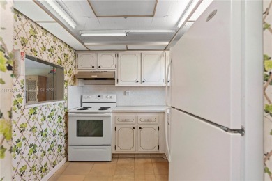 Imagine stepping out your front door and being just steps away on Sunrise Lakes Phase III in Florida - for sale on GolfHomes.com, golf home, golf lot