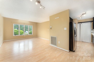 You must see this light-filled, two-story end unit condo at The on Black Mountain Golf Course in North Carolina - for sale on GolfHomes.com, golf home, golf lot