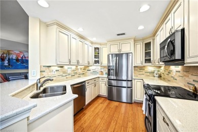 SIMPLY PERFECT! LONG LAKE VIEWS where nothing is out of place on Bonita Bay West in Florida - for sale on GolfHomes.com, golf home, golf lot