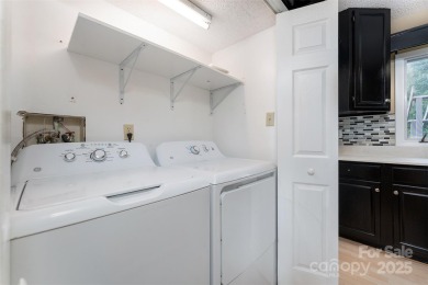 You must see this light-filled, two-story end unit condo at The on Black Mountain Golf Course in North Carolina - for sale on GolfHomes.com, golf home, golf lot