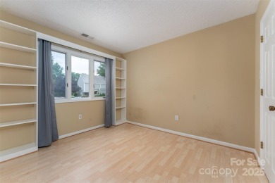 You must see this light-filled, two-story end unit condo at The on Black Mountain Golf Course in North Carolina - for sale on GolfHomes.com, golf home, golf lot