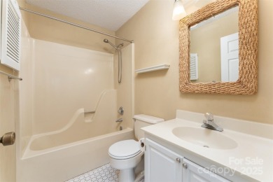 You must see this light-filled, two-story end unit condo at The on Black Mountain Golf Course in North Carolina - for sale on GolfHomes.com, golf home, golf lot