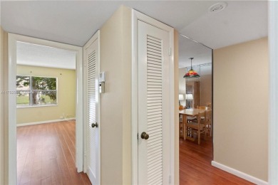 Imagine stepping out your front door and being just steps away on Sunrise Lakes Phase III in Florida - for sale on GolfHomes.com, golf home, golf lot