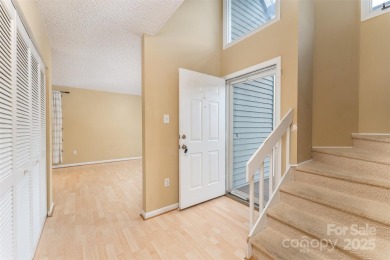 You must see this light-filled, two-story end unit condo at The on Black Mountain Golf Course in North Carolina - for sale on GolfHomes.com, golf home, golf lot