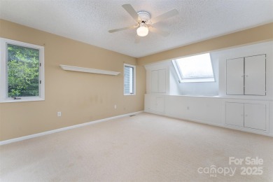 You must see this light-filled, two-story end unit condo at The on Black Mountain Golf Course in North Carolina - for sale on GolfHomes.com, golf home, golf lot