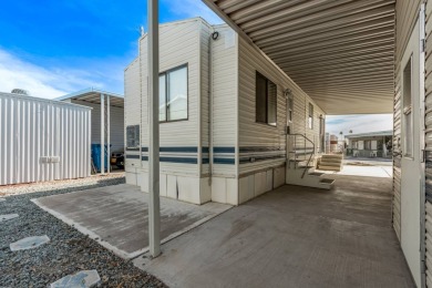 1 BEDROOM 1 BATH PARK MODEL WITH STORAGE SHED AND 2 CAR COVERED on Riverview Golf Course in Arizona - for sale on GolfHomes.com, golf home, golf lot