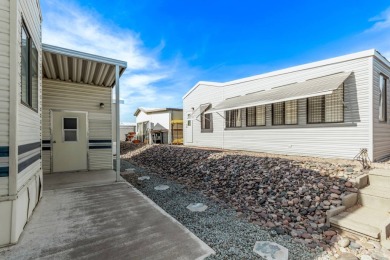 1 BEDROOM 1 BATH PARK MODEL WITH STORAGE SHED AND 2 CAR COVERED on Riverview Golf Course in Arizona - for sale on GolfHomes.com, golf home, golf lot