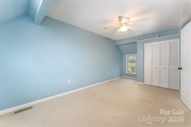 You must see this light-filled, two-story end unit condo at The on Black Mountain Golf Course in North Carolina - for sale on GolfHomes.com, golf home, golf lot