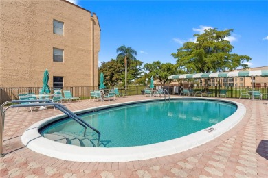Imagine stepping out your front door and being just steps away on Sunrise Lakes Phase III in Florida - for sale on GolfHomes.com, golf home, golf lot
