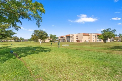 Imagine stepping out your front door and being just steps away on Sunrise Lakes Phase III in Florida - for sale on GolfHomes.com, golf home, golf lot