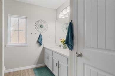 Lovely 4 bedroom, 2.5 bath townhome with a 2 car garage located on Harmony Golf Preserve in Florida - for sale on GolfHomes.com, golf home, golf lot