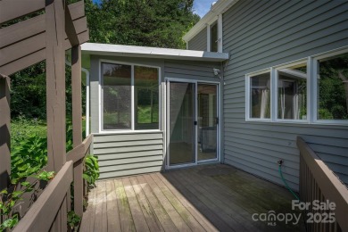 You must see this light-filled, two-story end unit condo at The on Black Mountain Golf Course in North Carolina - for sale on GolfHomes.com, golf home, golf lot