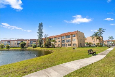 Imagine stepping out your front door and being just steps away on Sunrise Lakes Phase III in Florida - for sale on GolfHomes.com, golf home, golf lot
