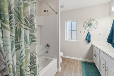 Lovely 4 bedroom, 2.5 bath townhome with a 2 car garage located on Harmony Golf Preserve in Florida - for sale on GolfHomes.com, golf home, golf lot