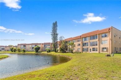 Imagine stepping out your front door and being just steps away on Sunrise Lakes Phase III in Florida - for sale on GolfHomes.com, golf home, golf lot