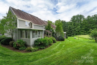 You must see this light-filled, two-story end unit condo at The on Black Mountain Golf Course in North Carolina - for sale on GolfHomes.com, golf home, golf lot