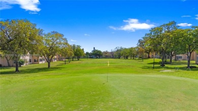 Imagine stepping out your front door and being just steps away on Sunrise Lakes Phase III in Florida - for sale on GolfHomes.com, golf home, golf lot