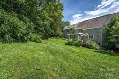 You must see this light-filled, two-story end unit condo at The on Black Mountain Golf Course in North Carolina - for sale on GolfHomes.com, golf home, golf lot