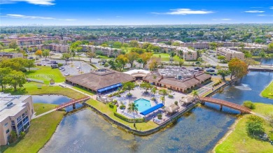 Imagine stepping out your front door and being just steps away on Sunrise Lakes Phase III in Florida - for sale on GolfHomes.com, golf home, golf lot