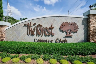TURNKEY, end-unit condo in The Forest Country Club! This 1,693 on The Forest Country Club in Florida - for sale on GolfHomes.com, golf home, golf lot