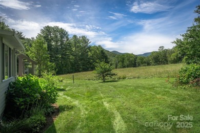 You must see this light-filled, two-story end unit condo at The on Black Mountain Golf Course in North Carolina - for sale on GolfHomes.com, golf home, golf lot