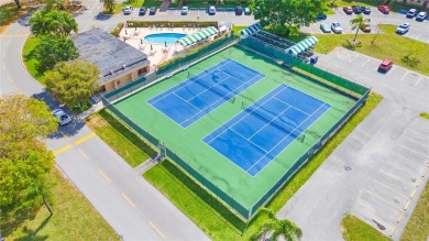 Imagine stepping out your front door and being just steps away on Sunrise Lakes Phase III in Florida - for sale on GolfHomes.com, golf home, golf lot