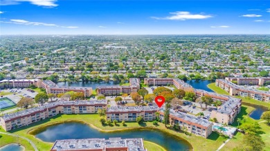 Imagine stepping out your front door and being just steps away on Sunrise Lakes Phase III in Florida - for sale on GolfHomes.com, golf home, golf lot