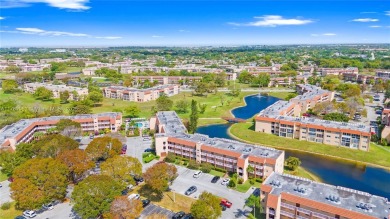 Imagine stepping out your front door and being just steps away on Sunrise Lakes Phase III in Florida - for sale on GolfHomes.com, golf home, golf lot