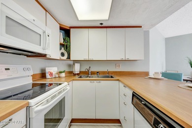 IN THE HEART OF DAYTONA BEACH SHORES, THIS CONDO BECKONS WITH on Oceans Golf Club in Florida - for sale on GolfHomes.com, golf home, golf lot