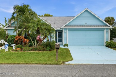 Beautifully updated home in a quiet New Smyrna Beach on Hidden Lakes Golf Club in Florida - for sale on GolfHomes.com, golf home, golf lot