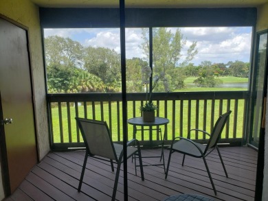 Newly painted, spacious corner unit 2/2 condo with water views on Village Golf Club in Florida - for sale on GolfHomes.com, golf home, golf lot