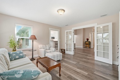 Beautifully updated home in a quiet New Smyrna Beach on Hidden Lakes Golf Club in Florida - for sale on GolfHomes.com, golf home, golf lot