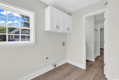 Windjammer Village community is conveniently located just inside on Glen Dornoch Waterway Golf Links in South Carolina - for sale on GolfHomes.com, golf home, golf lot