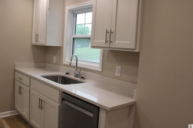 This beautifully renovated home has been completely gutted and on Benton Golf and Country Club in Kentucky - for sale on GolfHomes.com, golf home, golf lot