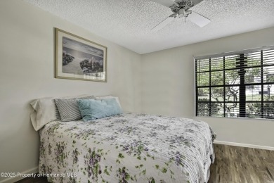 Discover this beautifully updated villa in the award-winning on Timber Pines Golf Course in Florida - for sale on GolfHomes.com, golf home, golf lot