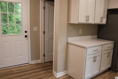 This beautifully renovated home has been completely gutted and on Benton Golf and Country Club in Kentucky - for sale on GolfHomes.com, golf home, golf lot